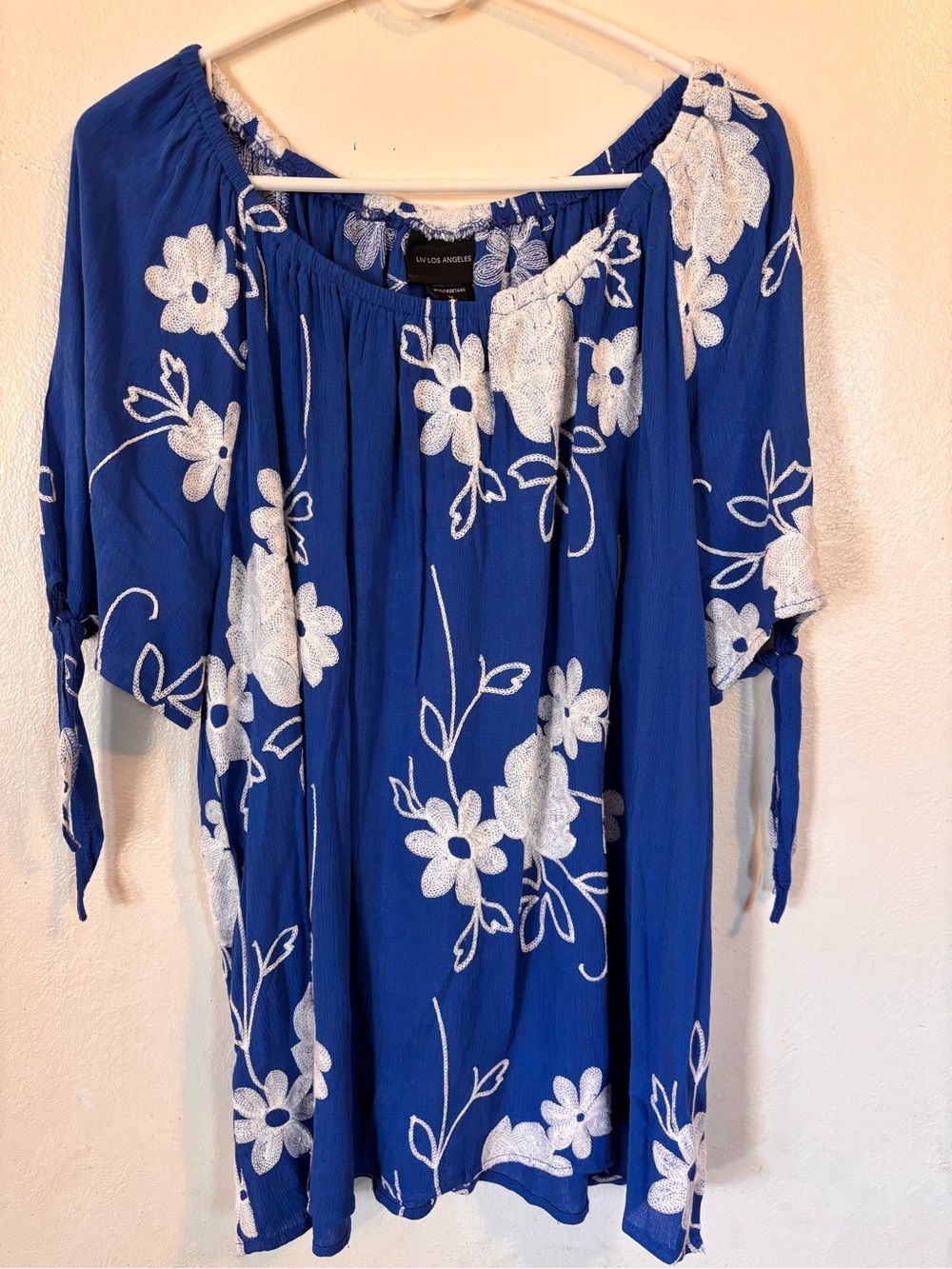 Blue Floral Peasant Top with White Embroidery by LIV Los Angelas